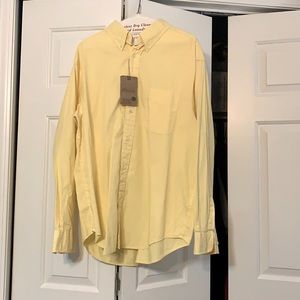 Never been worn long sleeve yellow button down